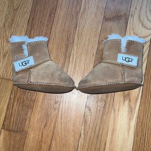 UGG baby moccasin boots.